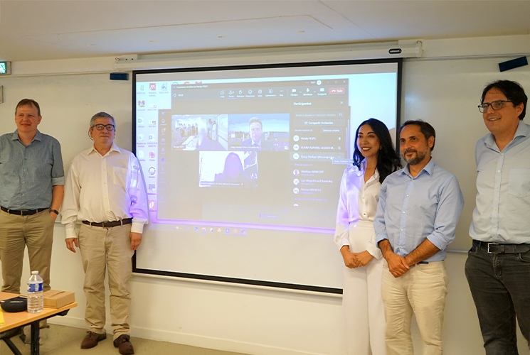 Nataly Aracely Pozo Viera surrounded by jury members after defending her PhD thesis at Isep on GaN-based power systems.